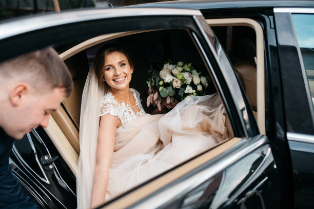 Happy bride on the day of his marriage poses for photographers
