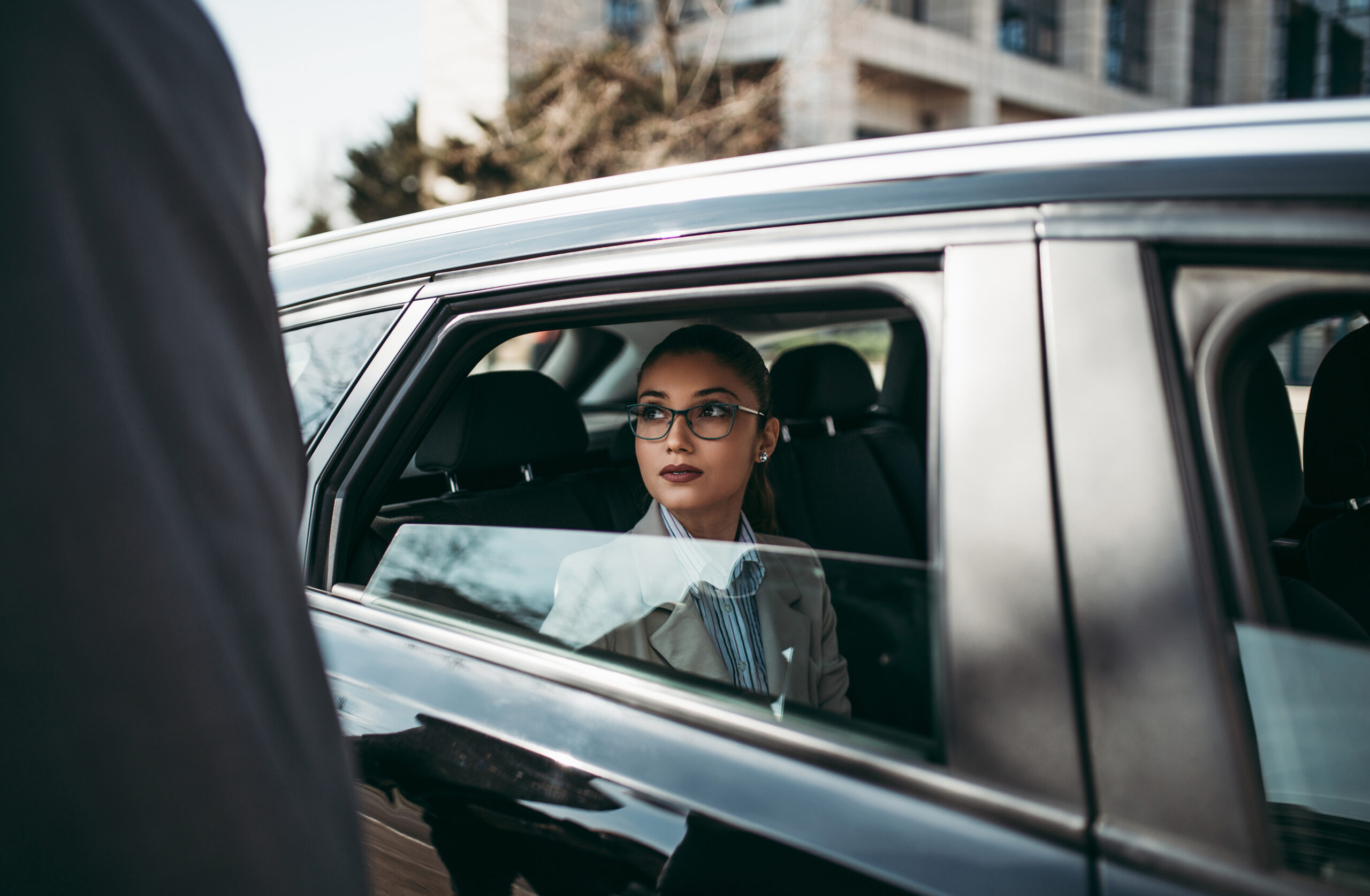 Business man and woman in car